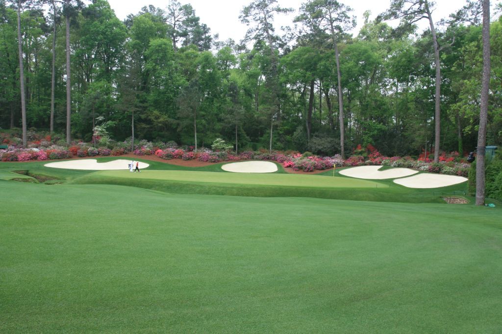 A wave of beautiful azaleas frame the treacherous 13th green.